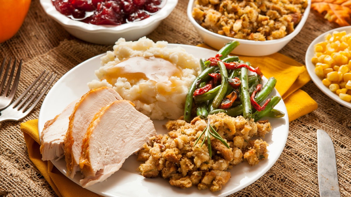 Homemade Turkey Thanksgiving Dinner with Mashed Potatoes, Stuffing, and Corn