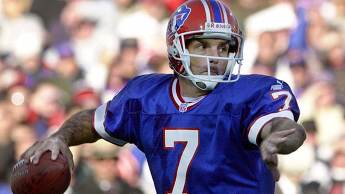 Buffalo Bills quarterback Doug Flutie looks to throw game against the New York Jets in Orchard Park, N.Y., in this Oct. 29, 2000 photo. Flutie, the Hail Mary-heaving Heisman winner who puzzled both opposing defenses and his own coaches with his unconventional style, retired Monday May 15, 2006 from professional football, according to a statement released by the New England Patriots. (AP Photo/Mike Groll)