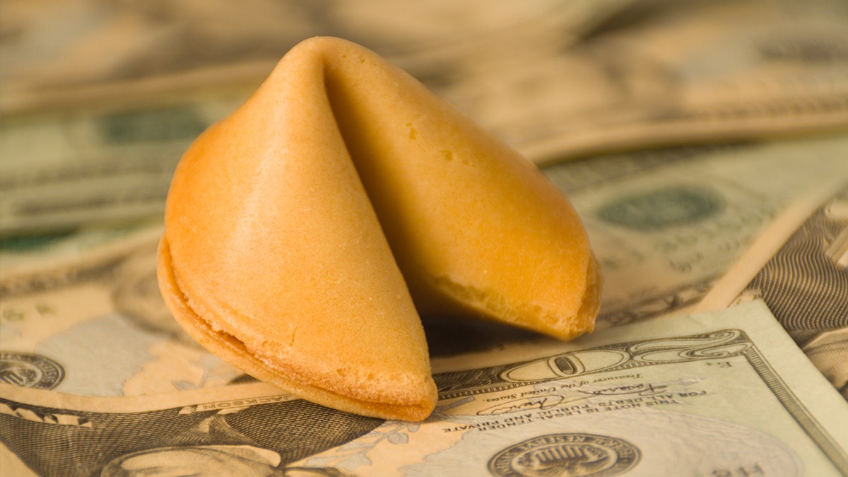 fortune cookie with money istock