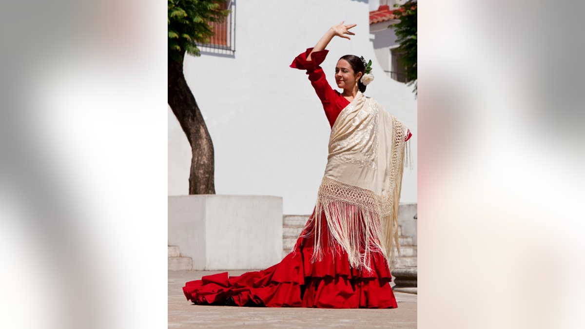 Traditional Woman Spanish Flamenco Dancer In Red Dress