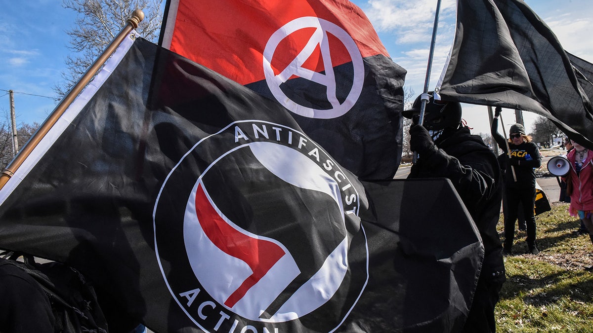 Ten anti-fascist protesters were arrested at a neo-Nazi rally in Georgia after some refused to remove the masks they were wearing at the demonstration.