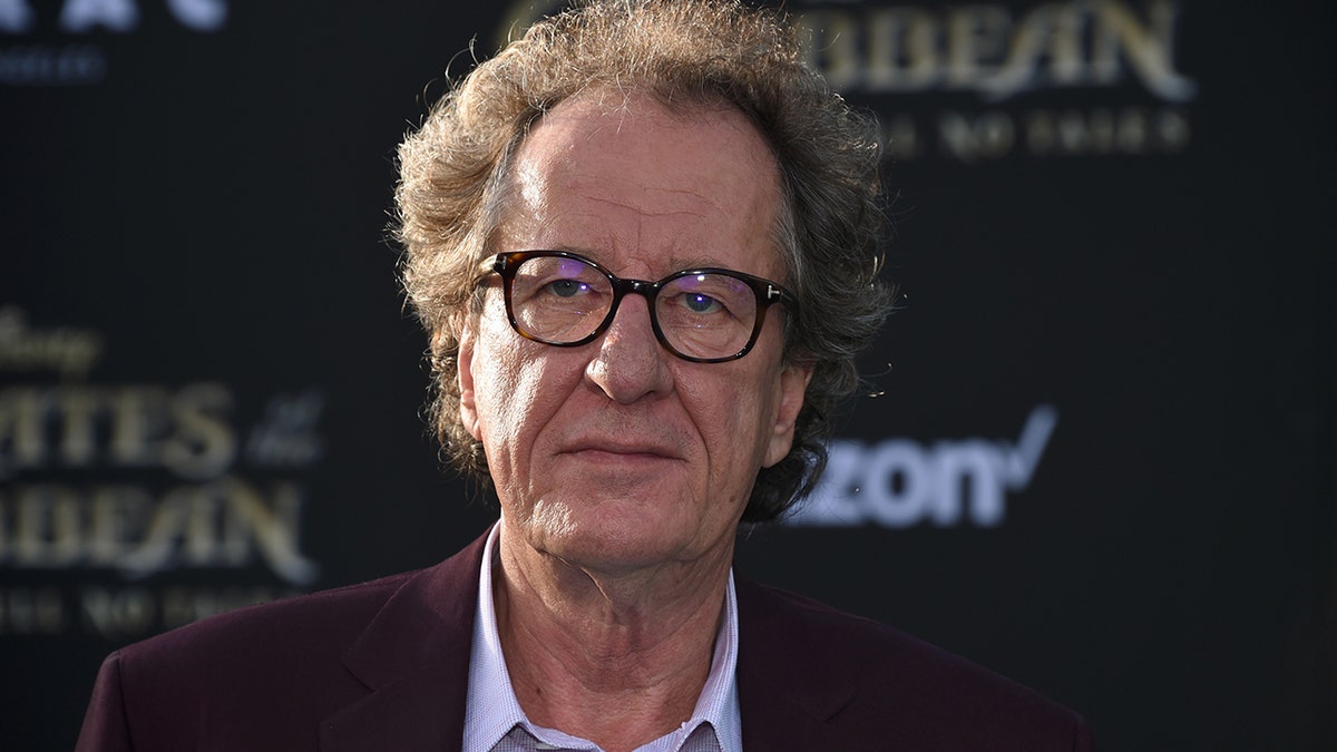 The Premiere of Disneyâs âPirates of the Caribbean: Dead Men Tell No Talesâ  â Los Angeles, California, U.S., 18/05/2017 - Actor Geoffrey Rush signs autographs. REUTERS/Phil Mccarten - HP1ED5J04K8IM