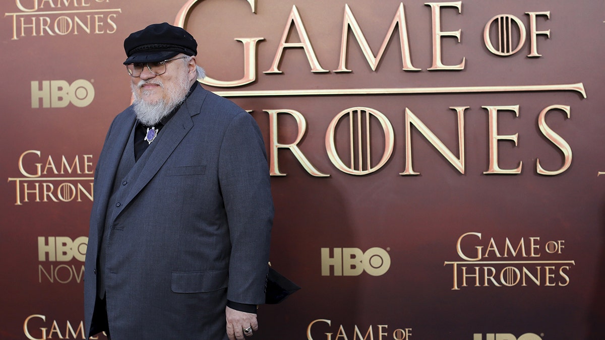 Co-executive producer George R.R. Martin arrives for the season premiere of HBO's 