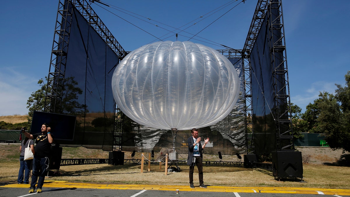 A Google Project Loon internet balloon is seen at the Google I/O 2016 developers conference in Mountain View, California May 19, 2016.  REUTERS/Stephen Lam - S1BETEZUEKAB