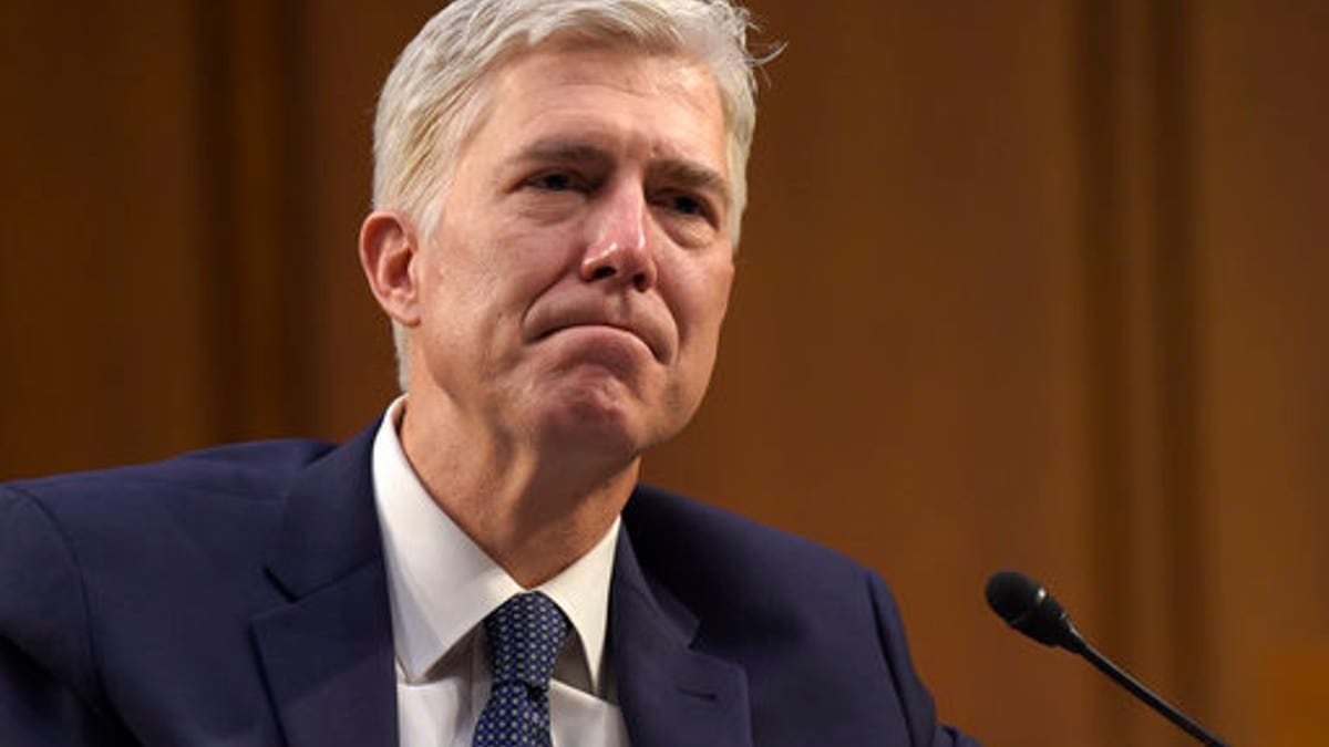 Supreme Court Justice nominee Neil Gorsuch listens as he is asked a question by Sen. Mazie Hirono, D-Hawaii, on Capitol Hill in Washington, Wednesday, March 22, 2017, during his confirmation hearing before the Senate Judiciary Committee. (AP Photo/Susan Walsh)