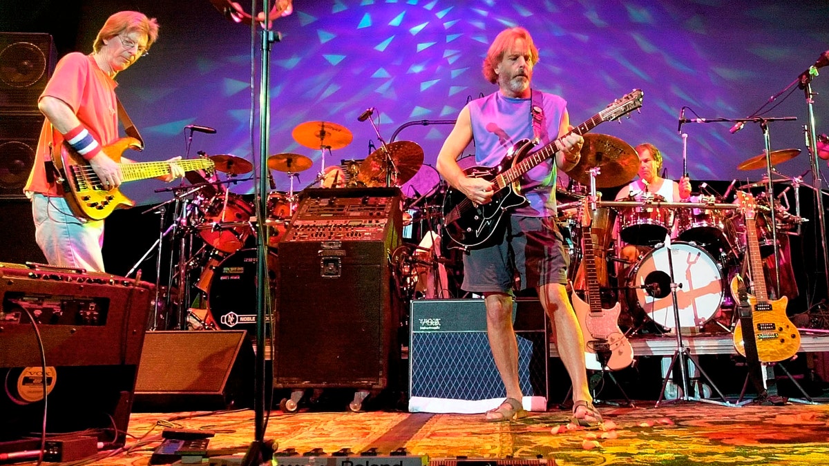Aug. 3, 2002.The Grateful Dead, from left, Phil Lesh, Bill Kreutzmann, Bob Weir and Mickey Hart perform during a reunion concert in East Troy, Wis.