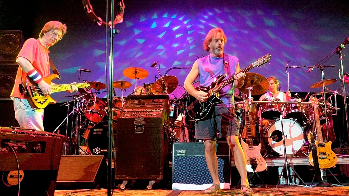 Aug. 3, 2002.The Grateful Dead, from left, Phil Lesh, Bill Kreutzmann, Bob Weir and Mickey Hart perform during a reunion concert in East Troy, Wis.