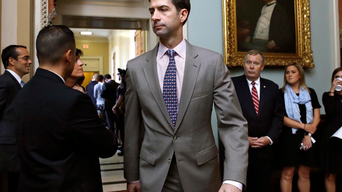 Sen. Tom Cotton, R-Ark., leaves a meeting of Republican senators Tuesday, Sept. 19, 2017, on Capitol Hill in Washington. (AP Photo/Jacquelyn Martin)