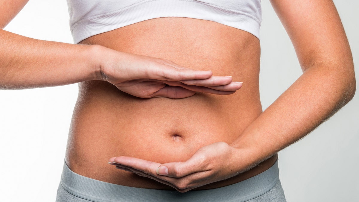 gut health womans belly digestion istock medium