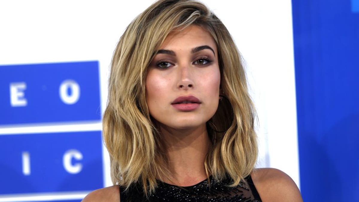 Model Hailey Baldwin arrives at the 2016 MTV Video Music Awards in New York, U.S., August 28, 2016.