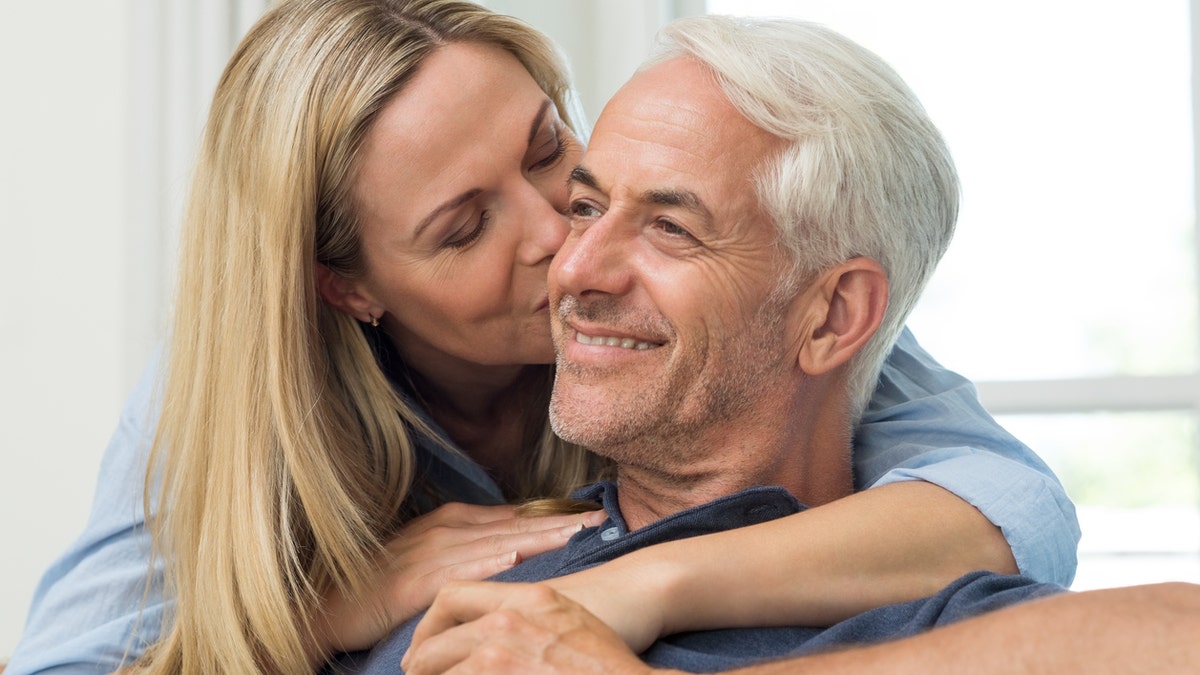 happy middle age couple istock