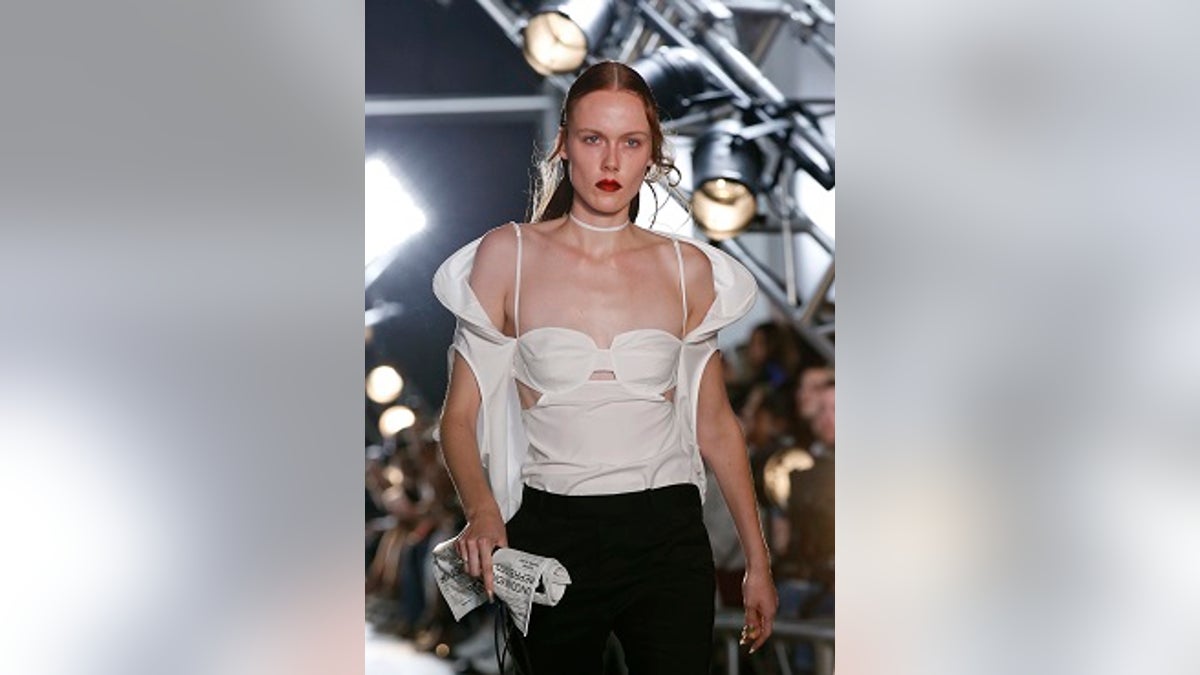 Helmut Lang sent a bra purse down the runway and people are