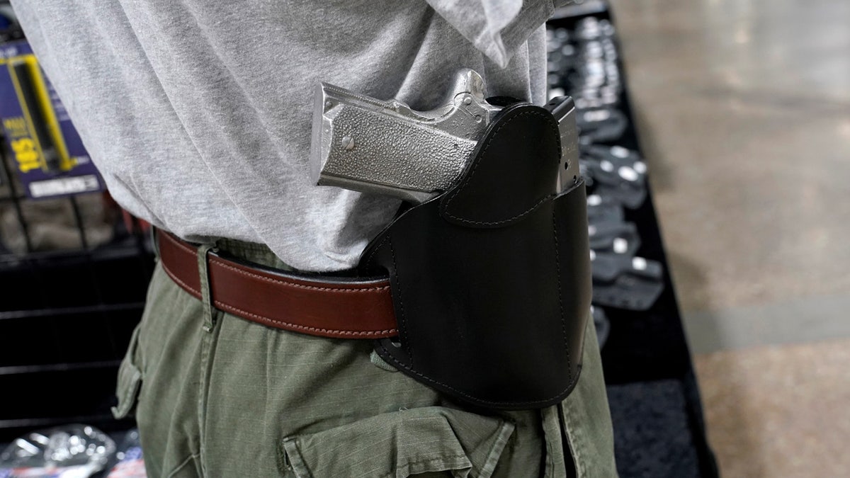 A concealed carry holster is displayed for sale at the Guntoberfest gun show in Oaks, Pennsylvania, U.S., October 6, 2017. REUTERS/Joshua Roberts - RC1ACCB8CE70