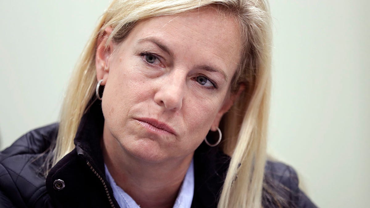 Homeland Secretary Kirstjen Nielsen listens during an interview Tuesday, Jan. 2, 2018, in San Diego. Nielsen told The Associated Press that the administration doesnât endorse citizenship for recipients of the Deferred Action for Childhood Arrivals program but that it would consider legislation that Congress passes.(AP Photo/Gregory Bull)