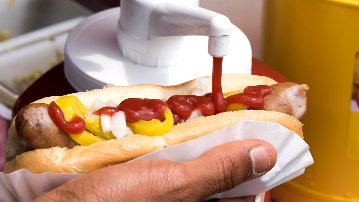hotdog with ketchup and mustard istock medium