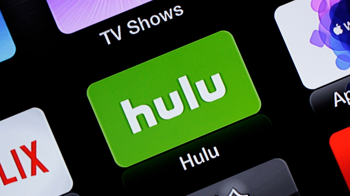 FILE - This June 24, 2015, file photo shows the Hulu Apple TV app icon. Nielsen says it will start counting how many people are watching live TV services from online streaming companies Hulu and YouTube, giving media companies and advertisers more insight on how many folks are watching network shows beyond the traditional TV screen. (AP Photo/Dan Goodman, File)