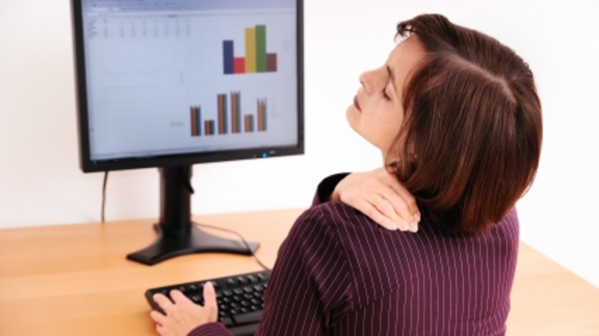 Business woman with neck pain
