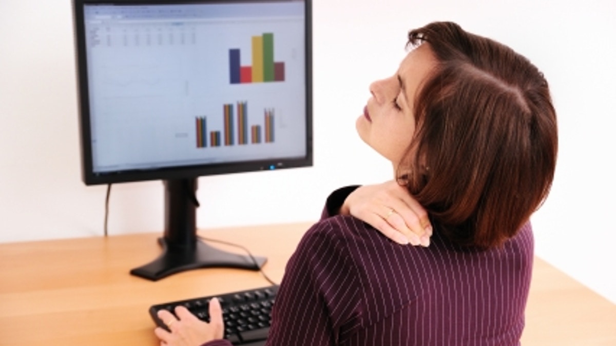 Business woman with neck pain