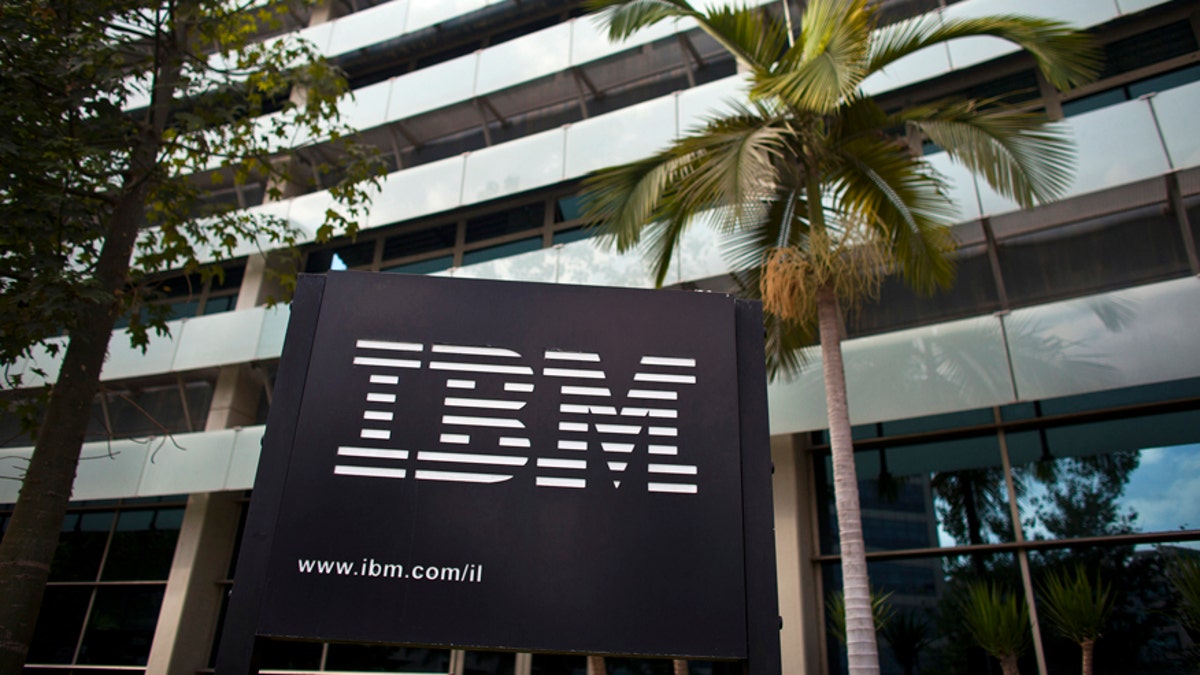 The IBM logo is seen outside the company's offices in Petah Tikva, near Tel Aviv October 24, 2011. REUTERS/Nir Elias (ISRAEL - Tags: BUSINESS SCIENCE TECHNOLOGY LOGO) - RTR2T4QN