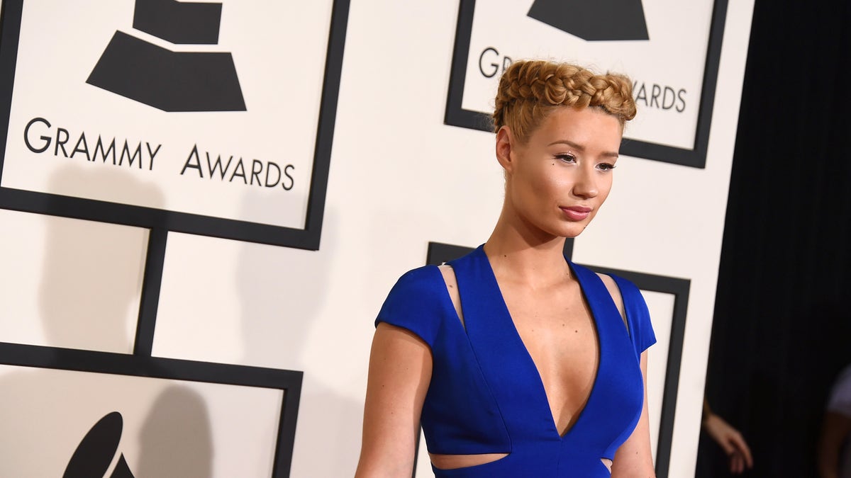 Iggy Azalea arrives at the 57th annual Grammy Awards at the Staples Center on Sunday, Feb. 8, 2015, in Los Angeles. (Photo by Jordan Strauss/Invision/AP)