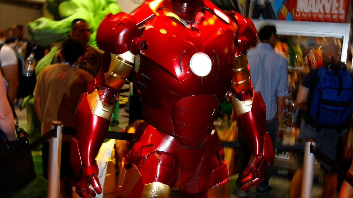 A life size "Iron Man" is on display in the Marvel booth at the 39th annual Comic Con Convention in San Diego July 24, 2008. More than 125,000 people are expected to attend the four-day event and indulge in a veritable feast of the latest in comic-related books, movie toys, games and memorabilia. REUTERS/Mike Blake (UNITED STATES) - RTX83HV