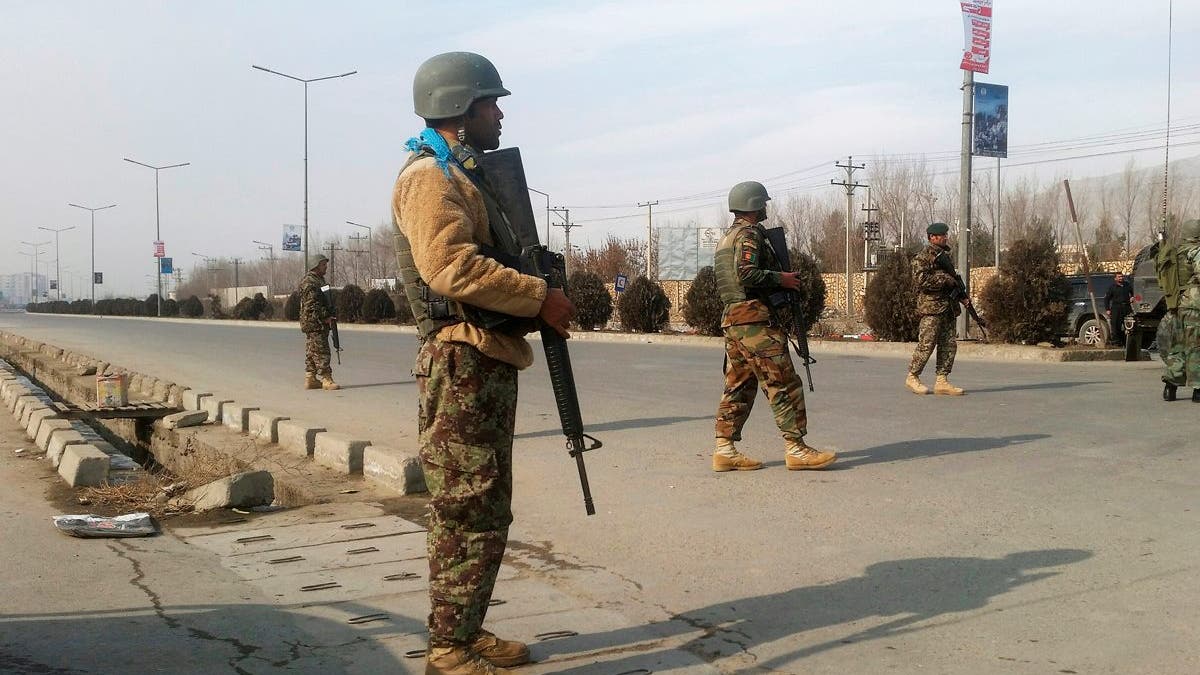 Afghan security forces keep watch at the site of an attack in Kabul, Afghanistan December 18 ,2017. REUTERS/Omar Sobhani - RC1BDDD0B8C0