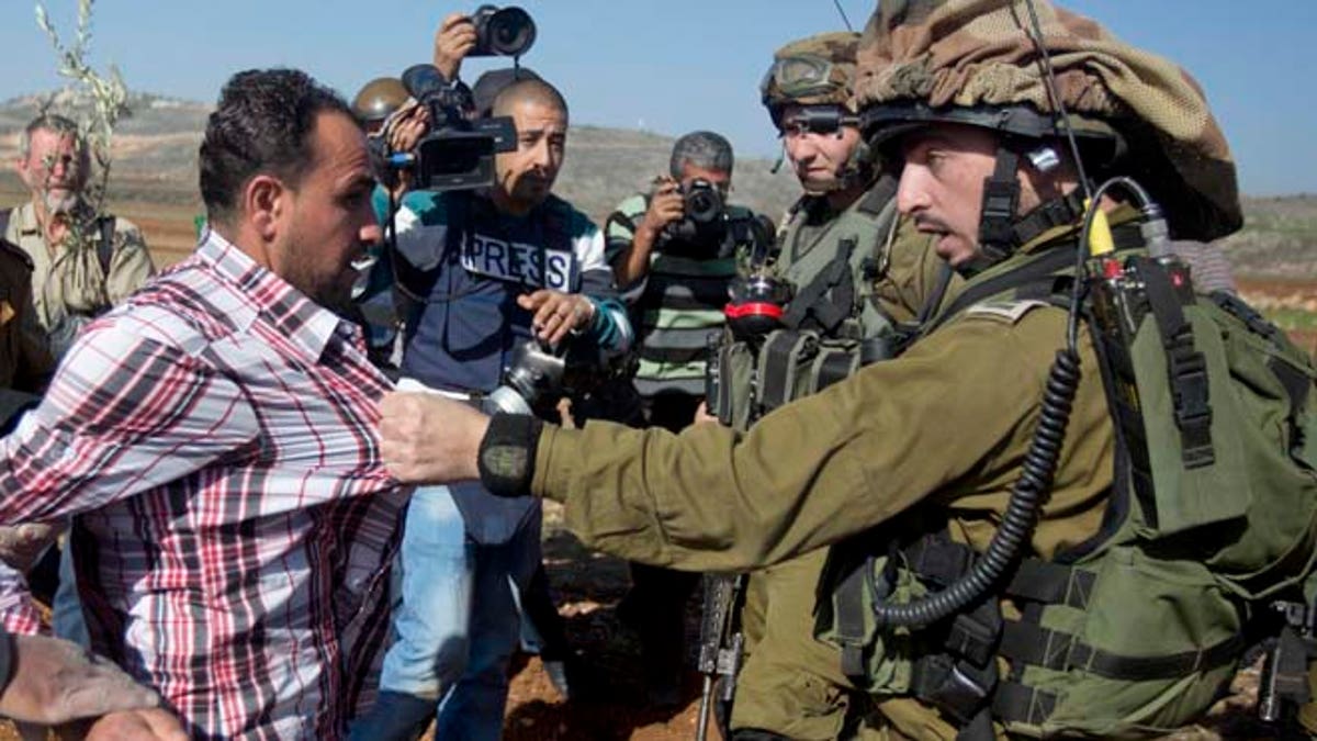 1bc4c1ec-Mideast Israel Palestinians