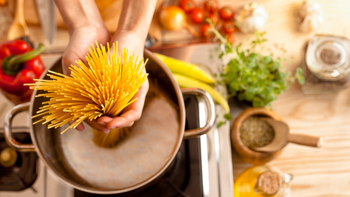 preparing spaghetti