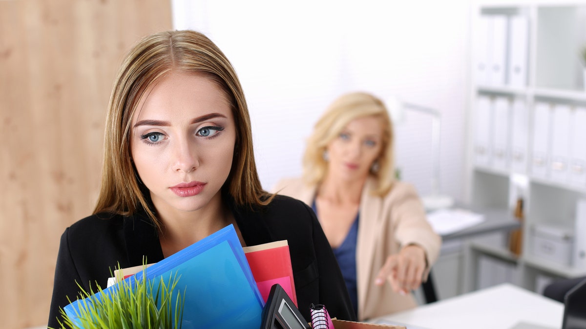 woman fired istock