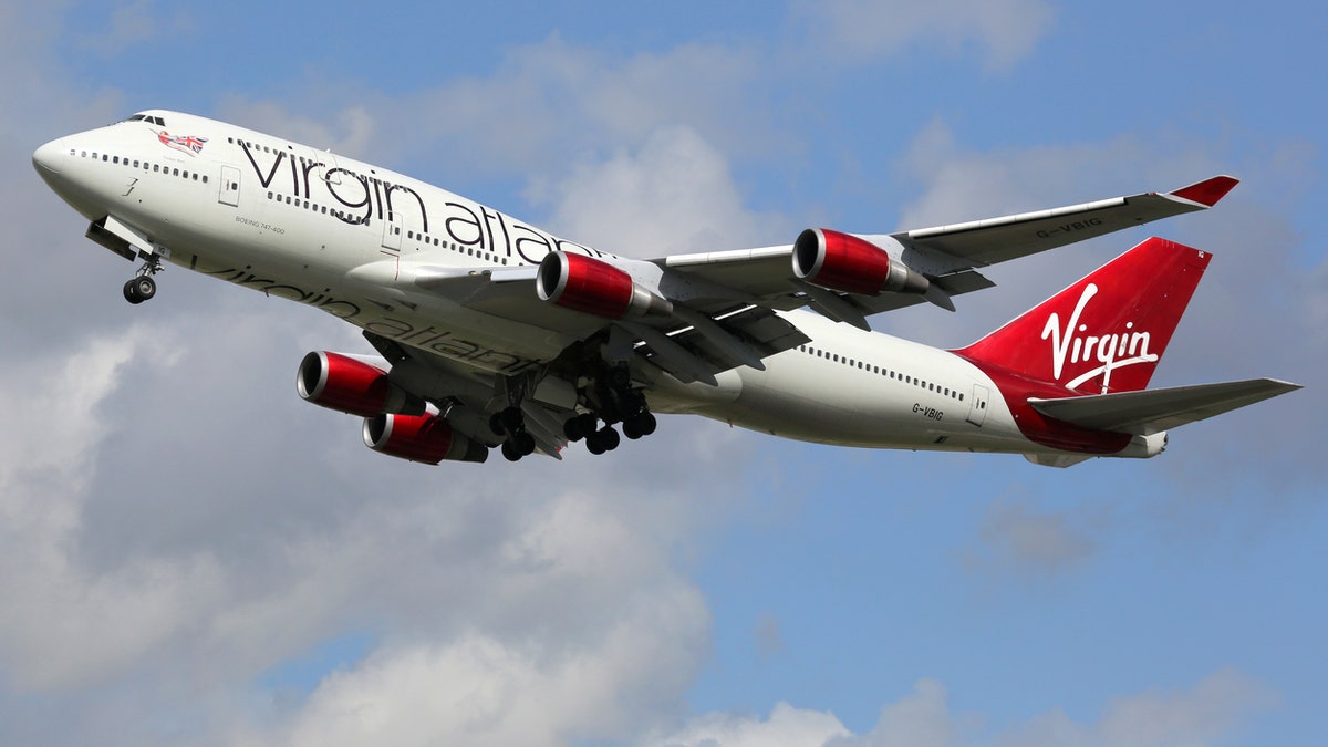 London Heathrow, United Kingdom - August 28, 2015: A Virgin Atlantic Boeing 747-400 with the registration G-VBIG taking off from London Heathrow Airport (LHR) in the United Kingdom. Virgin Atlantic Airways is a British airline with a base at London Heathrow airport.
