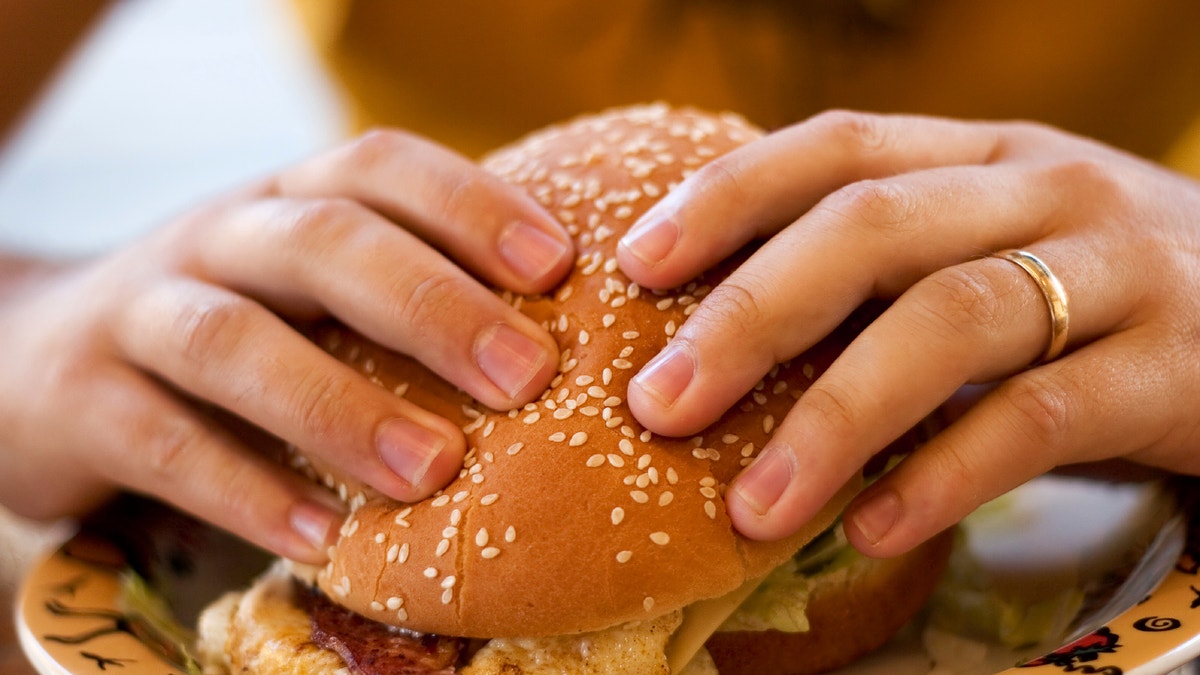 overeating_burger_istock