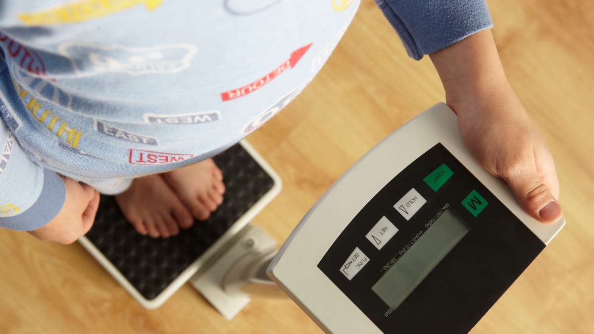 overweight_child_weight_scale_istock