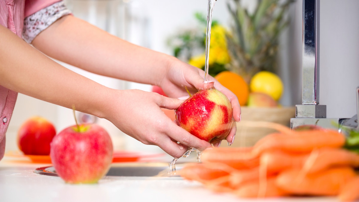 fruit_washing_apple_istock