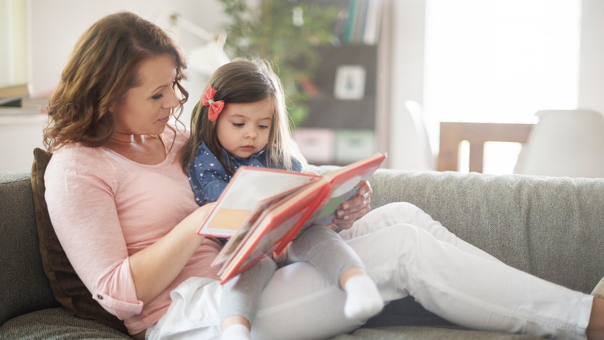 mother_reading_daughter_children_istock