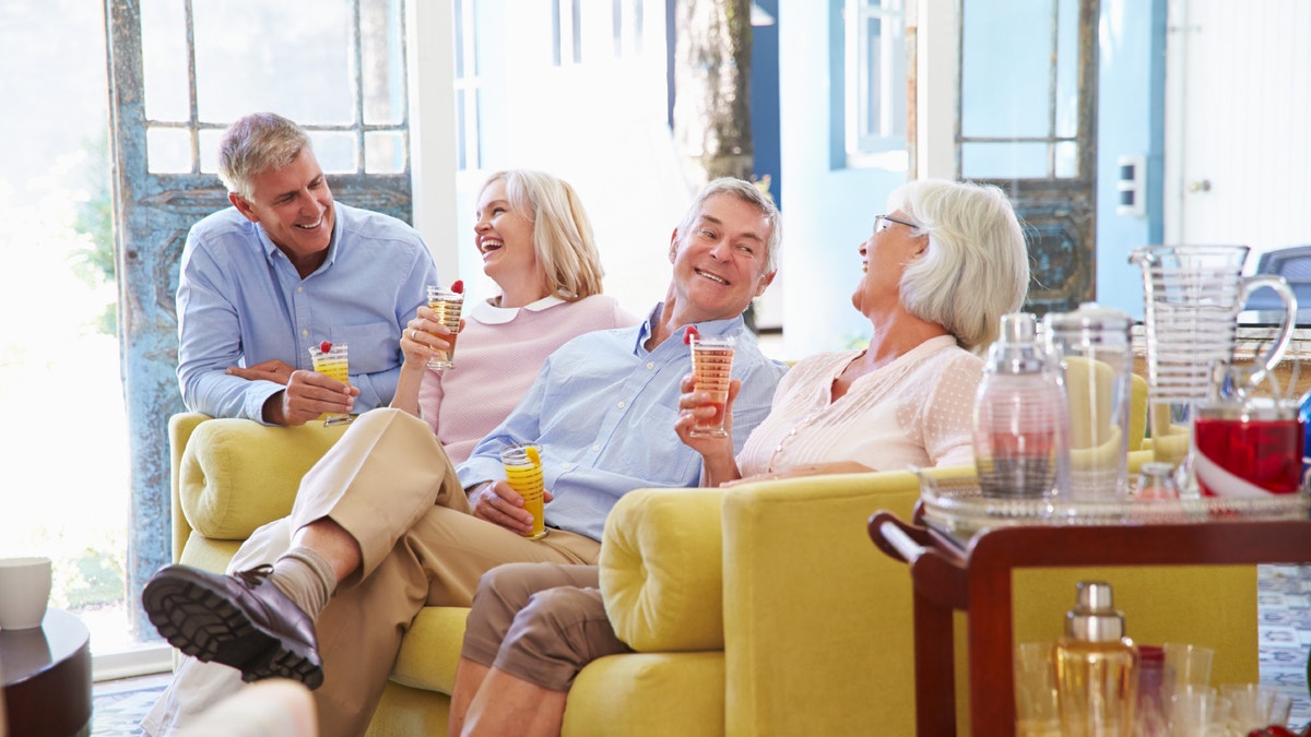 friends_laughing_couch_istock