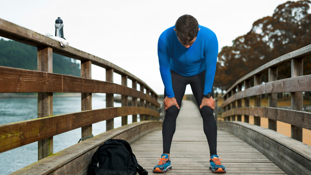 man_tired_workout_exercise_istock