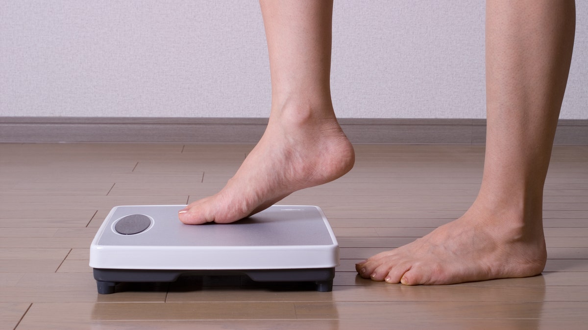 scale_weight_loss_feet_istock