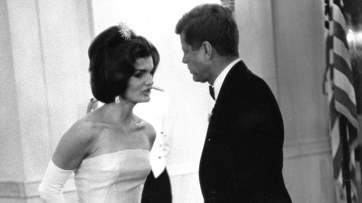 Former United States President John F. Kennedy and first lady Jackie Kennedy attend a dinner in honor of Andre Malraux, minister of state for cultural affairs of France, in Washington, in this handout image taken on May 11, 1962. November 22, 2013 will mark the 50th anniversary of the assassination of President Kennedy. REUTERS/Robert Knudsen/The White House/John F. Kennedy Presidential Library  (UNITED STATES - Tags: POLITICS ANNIVERSARY)    ATTENTION EDITORS - THIS IMAGE WAS PROVIDED BY A THIRD PARTY. FOR EDITORIAL USE ONLY. NOT FOR SALE FOR MARKETING OR ADVERTISING CAMPAIGNS. THIS PICTURE IS DISTRIBUTED EXACTLY AS RECEIVED BY REUTERS, AS A SERVICE TO CLIENTS - RTX15FKN
