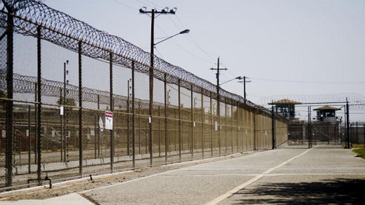 CHINO, CA - AUGUST 19: The California Institution for Men prison fence is seen on August 19, 2009 in Chino, California. After touring the prison where a riot took place on August 8th, California Governor Arnold Schwarzenegger said that the prison system is collapsing and needs to be reformed. (Photo by Michal Czerwonka/Getty Images)