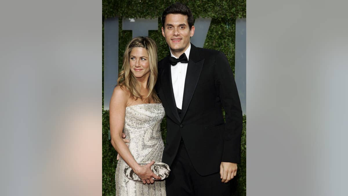 Jennifer Aniston and John Mayer seen on a red carpet
