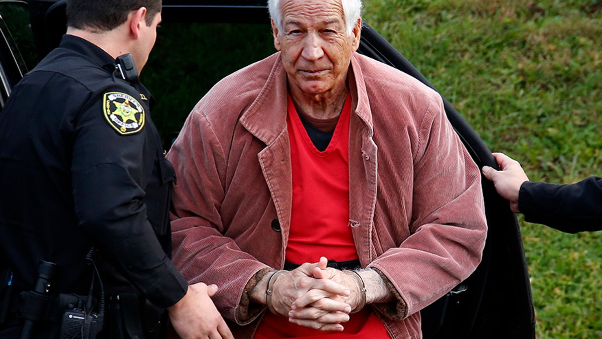 FILE - In this Oct. 29, 2015, file photo, former Penn State University assistant football coach Jerry Sandusky arrives for an appeal hearing at the Centre County Courthouse in Bellefonte, Pa. A Pennsylvania judge is set to announce whether Sandusky will get a second shot at persuading a jury heâs innocent of child molestation charges. Judge John Foradora says heâll post his opinion and order in Sanduskyâs request for a new trial or dismissal of charges online at noon on Wednesday, Oct. 18, 2017. (AP Photo/Gene J. Puskar, File)