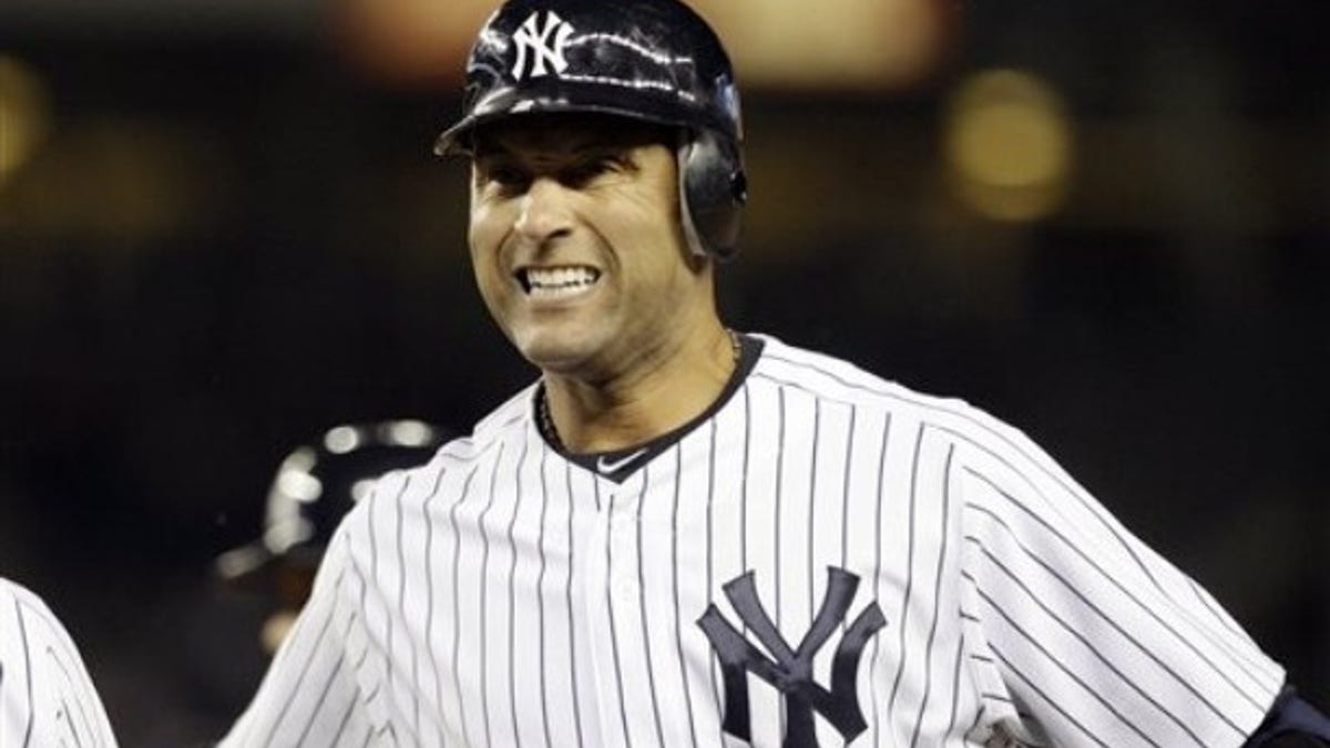 New York Yankees' Derek Jeter (2) reacts after hitting a fly-out during the fourth inning of a baseball game against the Minnesota Twins at Yankee Stadium in New York, Wednesday, April 18, 2012. (AP Photo/Frank Franklin II)