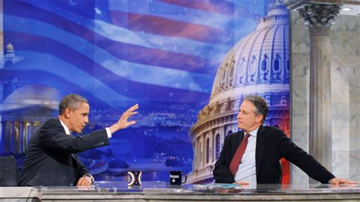 2ee2b568-APTOPIX Obama Daily Show