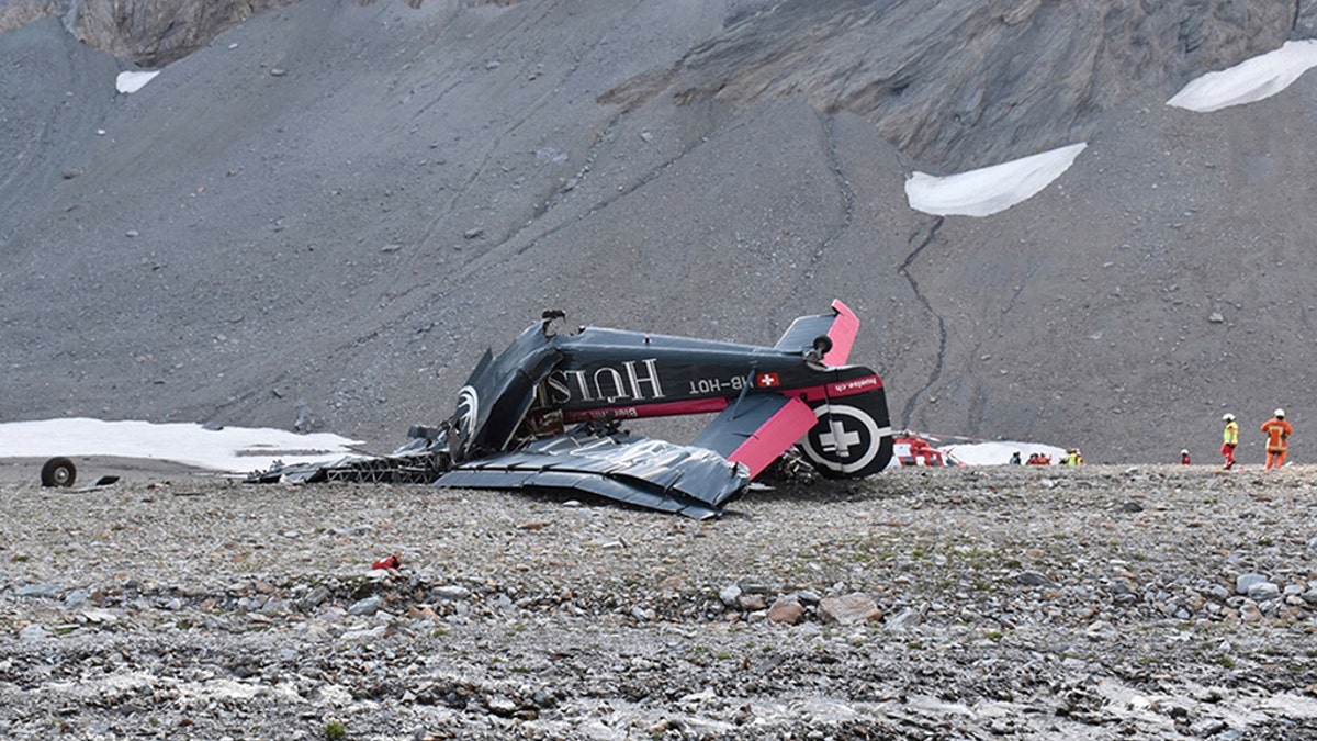 73e9456b-wreckage of the old-time propeller plane Ju 52 after it went down went down Saturday Aug, 4 2018