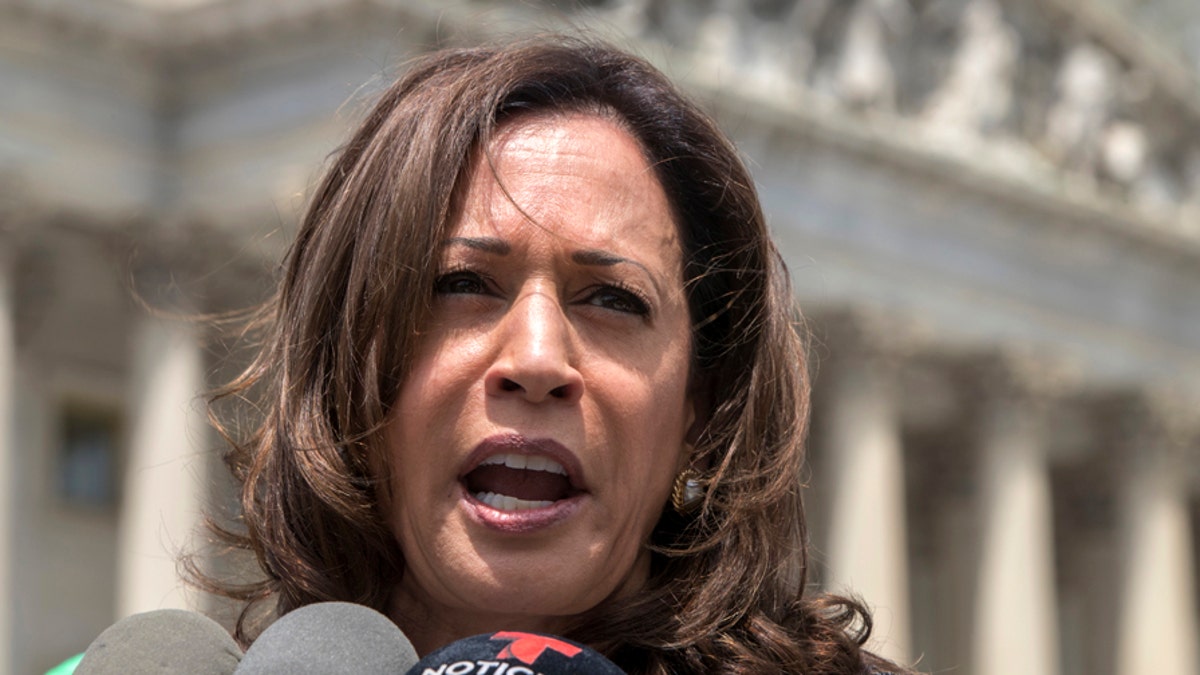 FILE - In this May 23, 2018, file photo, Sen. Kamala Harris, D-Calif., joins an women's advocacy group, MomsRising, to protest against threats by President Donald Trump against Central American asylum-seekers to separate children from their parents along the southwest border to deter migrants from crossing into the United States, at the Capitol in Washington. The White House is using its official Twitter handle to target Democratic lawmakers who have criticized President Donald Trump's immigration policies, drawing complaints that government resources are being used to undercut potential 2020 rivals. The White House handle falsely accused Harris on July 2 of 