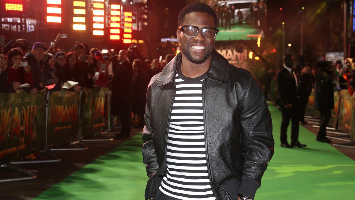 FILE - In this Dec. 7, 2017 file photo, Kevin Hart poses for photographers upon arrival at premiere of the film 'Jumanji, Welcome To The Jungle' in London. Hartââ¬â¢s private jet blew a tire landing at Bostonââ¬â¢s Logan Airport on Thursday, May 3, 2018. In a Snapchat video, Hart said it ââ¬Åfishtailed like crazy.ââ¬Â The 38-year-old said ââ¬ÅI got real angels on my back.ââ¬Â(Photo by Joel C Ryan/Invision/AP, File