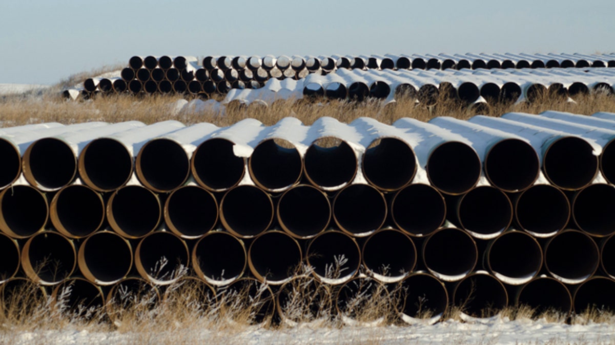 This Nov. 14, 2014 file photo shows a depot used to store pipes for Transcanada Corp's planned Keystone XL oil pipeline in Gascoyne, N.D.