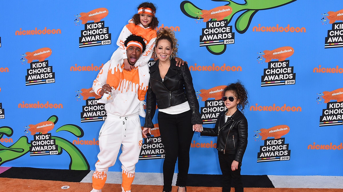 Nick Cannon, center left, Mariah Carey, center right, and from left, their children Moroccan and Monroe arrive at the Kids' Choice Awards at The Forum on Saturday, March 24, 2018, in Inglewood, Calif. (Photo by Jordan Strauss/Invision/AP)