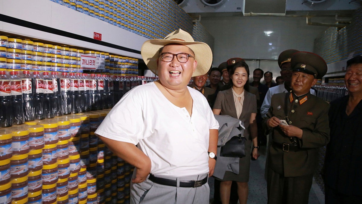 Kim Jong Un visited a fish-pickling factory.