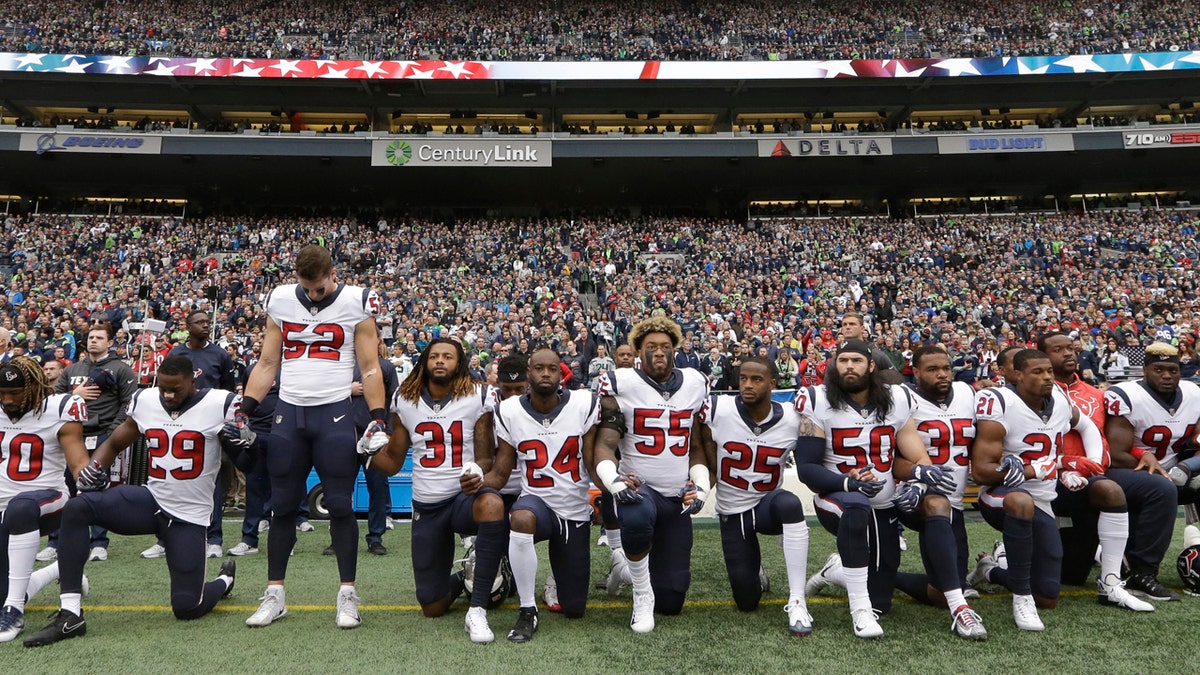 texans kneeling